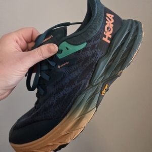Hoka Navy and Teal Trail Shoes